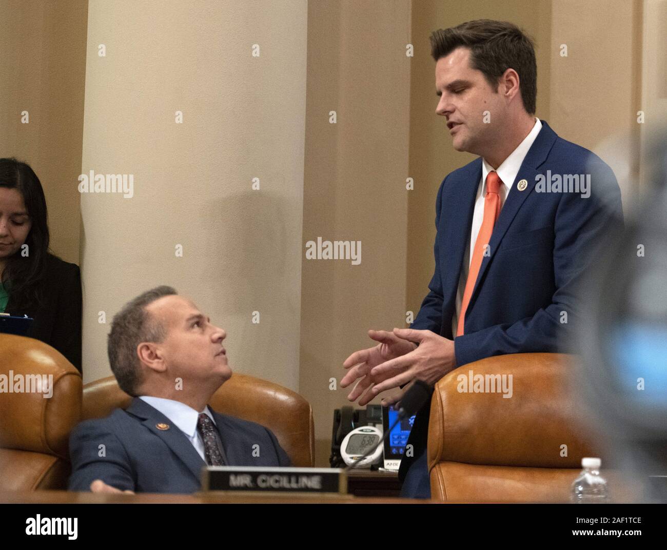 Washington, District of Columbia, USA. 11th Dec, 2019. United States Representative David Cicilline (Democrat of Rhode Island), left, and US Representative Matt Gaetz (Republican of Florida), right, confer prior to hearing opening statements as the US House Committee on the Judiciary begins its markup of House Resolution 755, Articles of Impeachment Against President Donald J. Trump, in the Longworth House Office Building in Washington, DC on Wednesday, December 11, 2019 Credit: Ron Sachs/CNP/ZUMA Wire/Alamy Live News Stock Photo