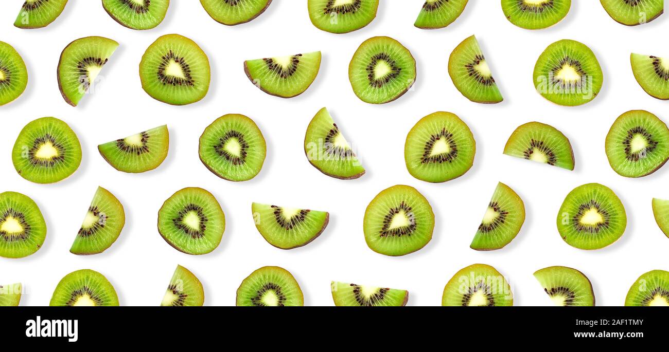 Kiwi fruit Slices macro. Ripe Kiwi fruit isolated on white background. Stock Photo