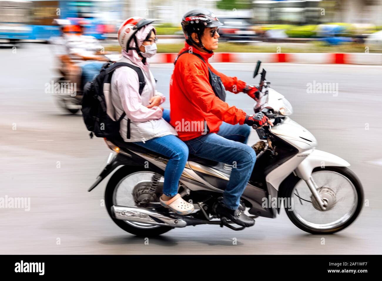 Ho Chi Minh City formerly Saigon 2 people on motorbike Stock Photo