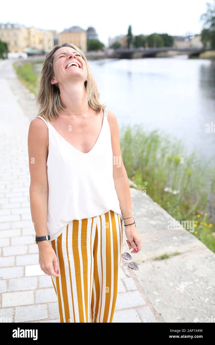 Woman standing by river hi-res stock photography and images - Alamy
