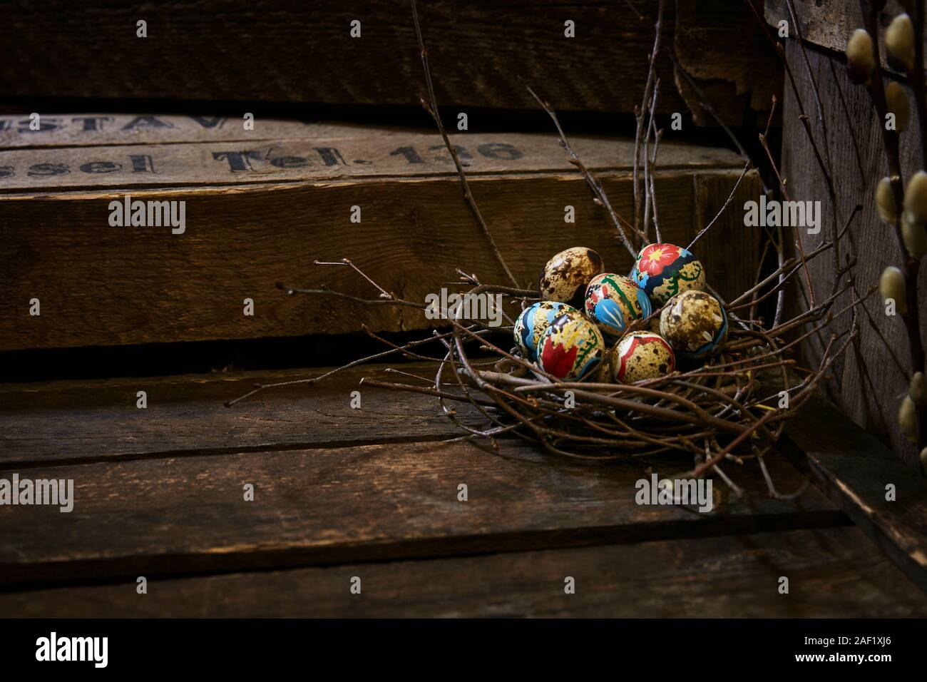 Easter eggs in twig nest Stock Photo