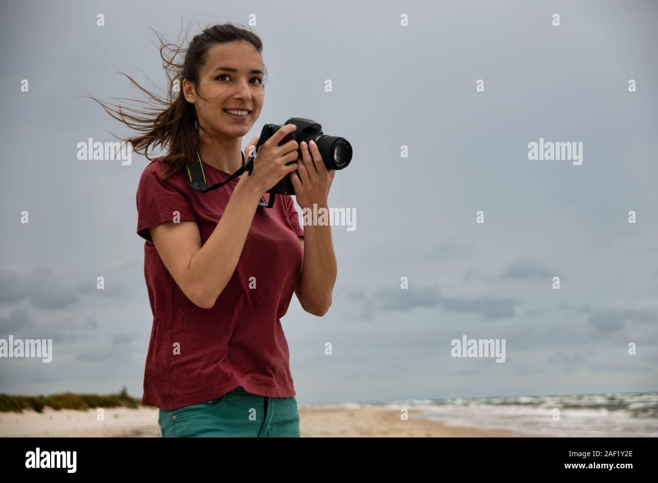 Female photographer with camera Stock Photo