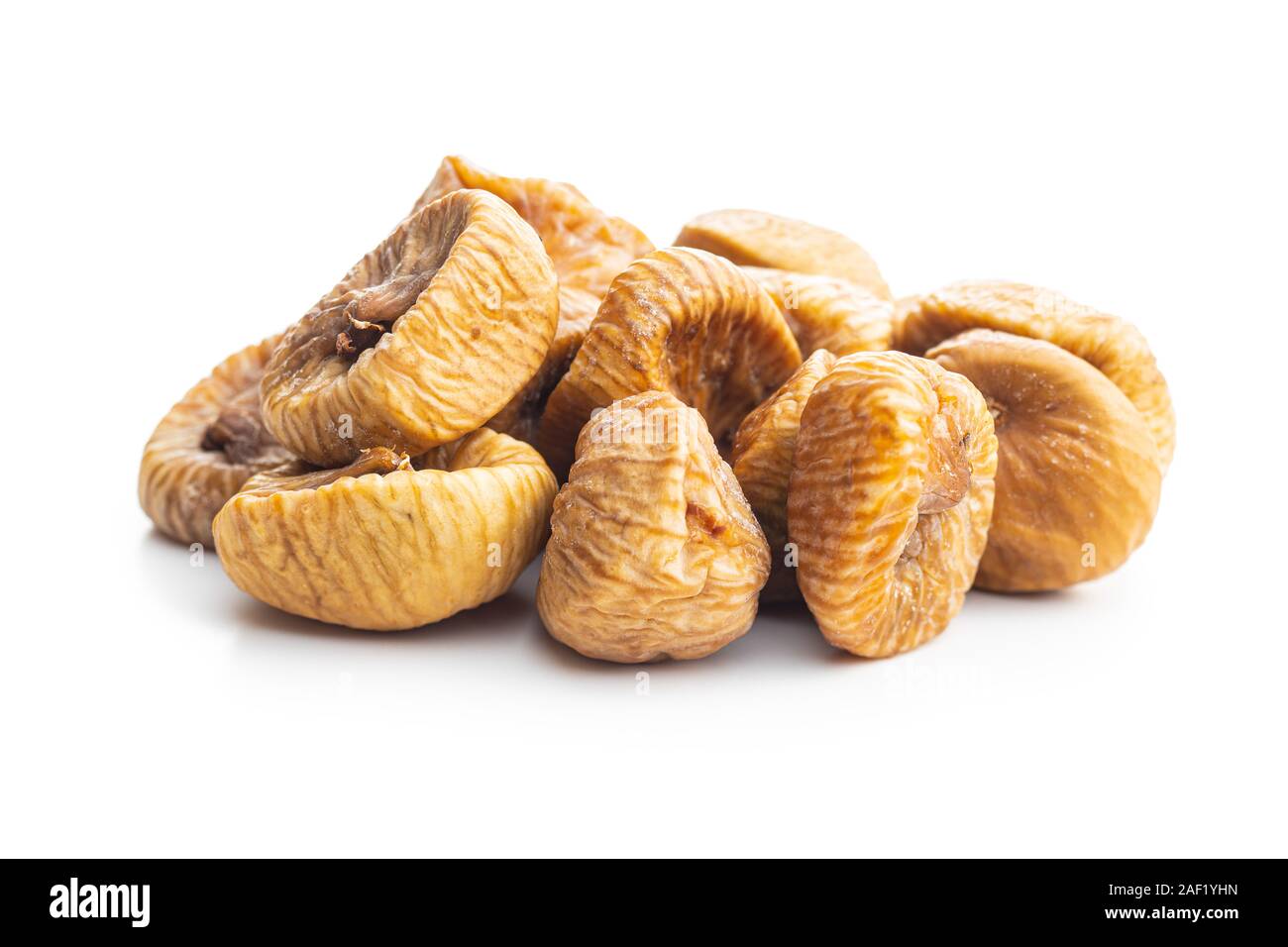 Sweet dried figs isolated on white background. Stock Photo