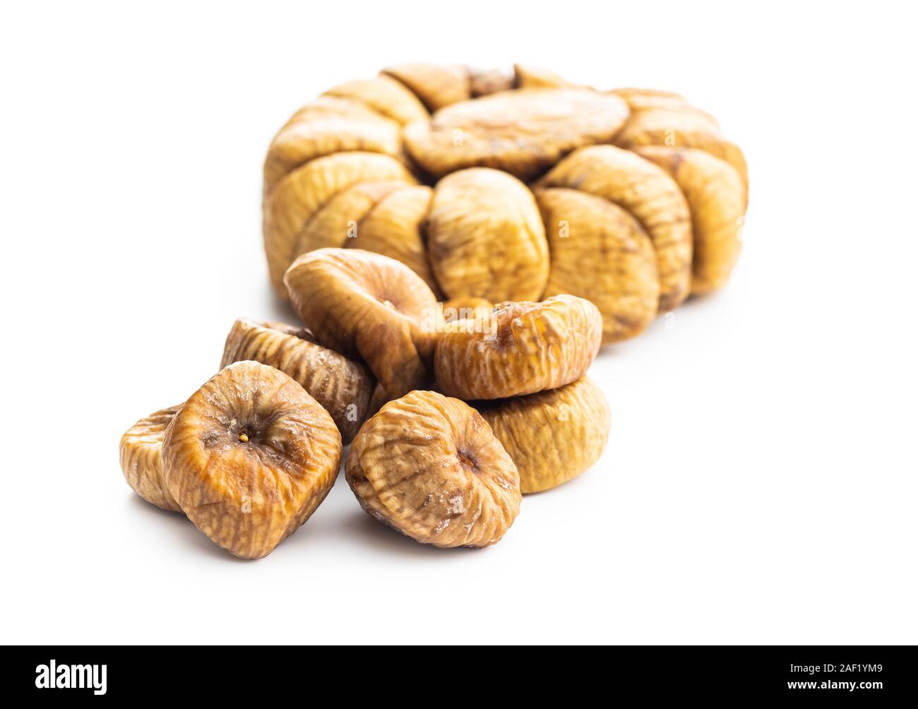 Sweet dried figs isolated on white background. Stock Photo