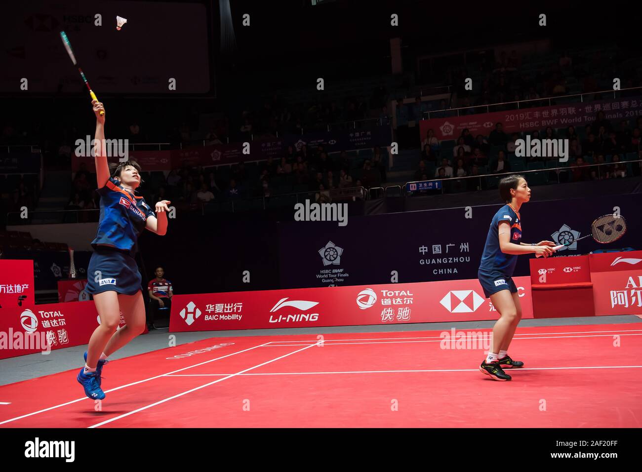 Japanese professional badminton players Yuki Fukushima and Sayaka Hirota  compete against Indonesian professional badminton players Greysia Polii and  Apriyani Rahayu at the group stage of women's doubles at HSBC BWF World Tour