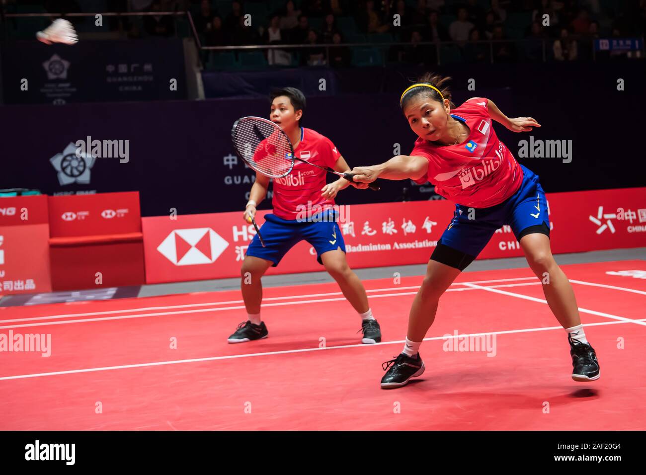 Indonesian professional badminton players Greysia Polii and Apriyani Rahayu  compete against Japanese professional badminton players Yuki Fukushima and  Sayaka Hirota at the group stage of women's doubles at HSBC BWF World Tour