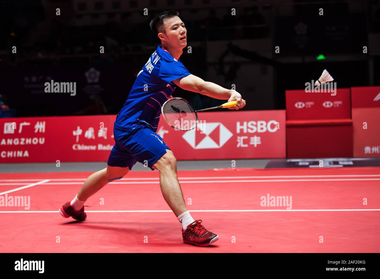 Wang Tzu-wei of China Taiwan competes against Kento Momota of Japan at group stage of men's singles of HSBC BWF World Tour Finals, Guangzhou city, south China's Guangdong province, 11 December 2019. Kento Momota of Japan defeated Wang Tzu-wei of China Taiwan with 2-0. Stock Photo