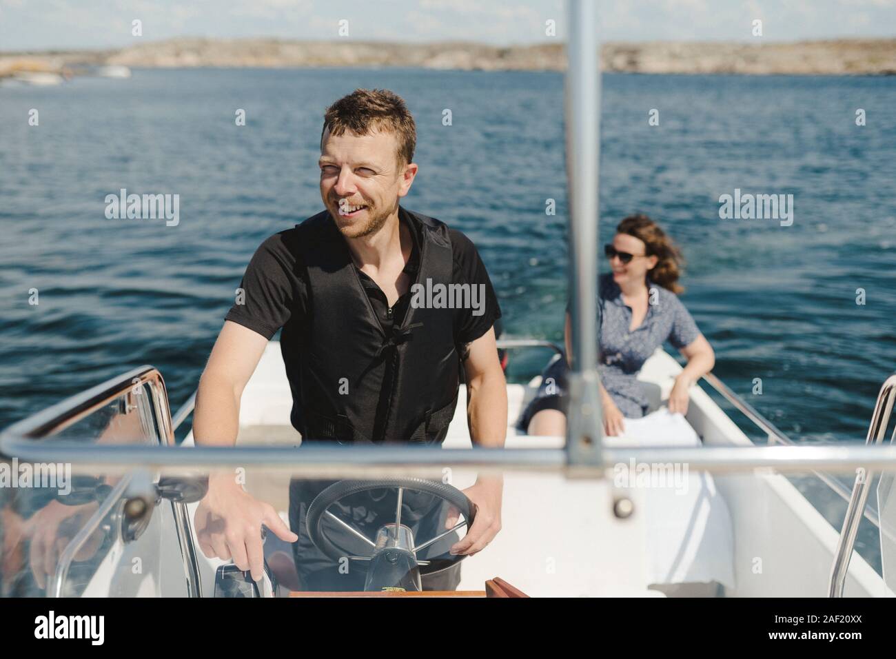 Steer the boat hi-res stock photography and images - Alamy