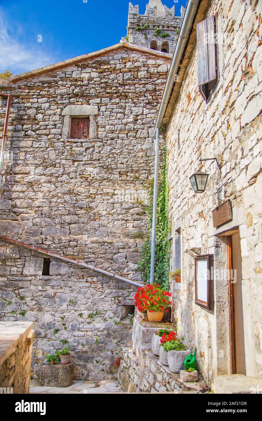 Town of Hum, beautiful old stone traditional architecture in Istria, coutryside landscape Stock Photo