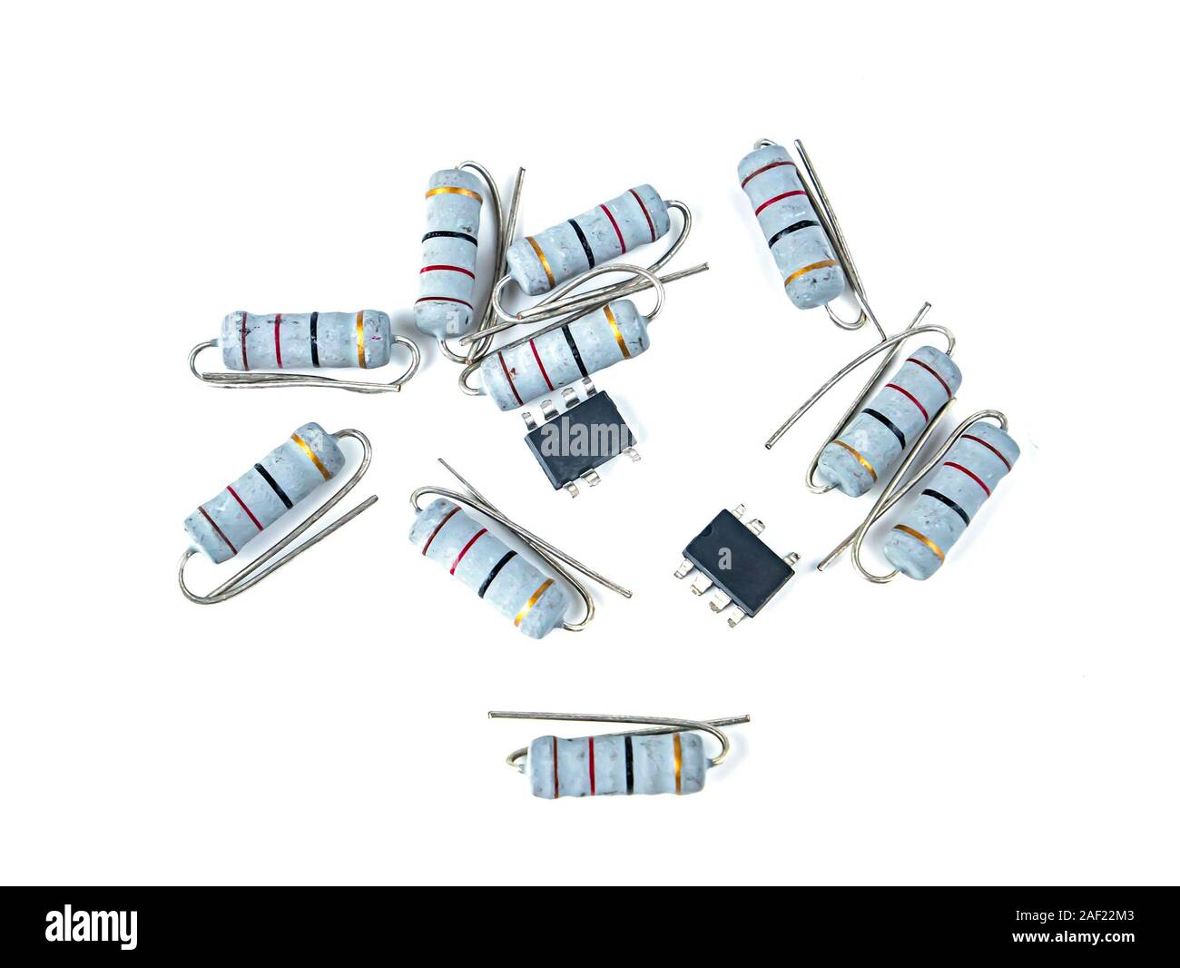 Electronic parts on a white background with place for text. Capacitor