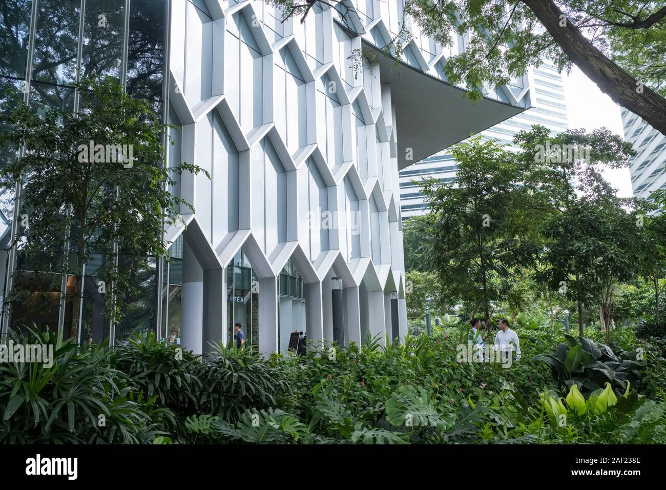 Singapore: park at the bottom of the DUO twin towers (architect Buro Ole Scheeren) Stock Photo