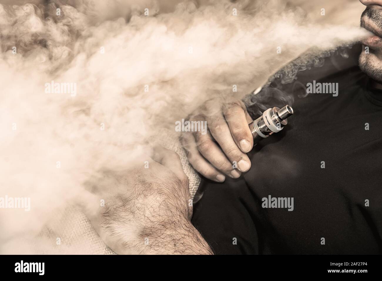 Electronic cigarettes smoke hires stock photography and images Alamy