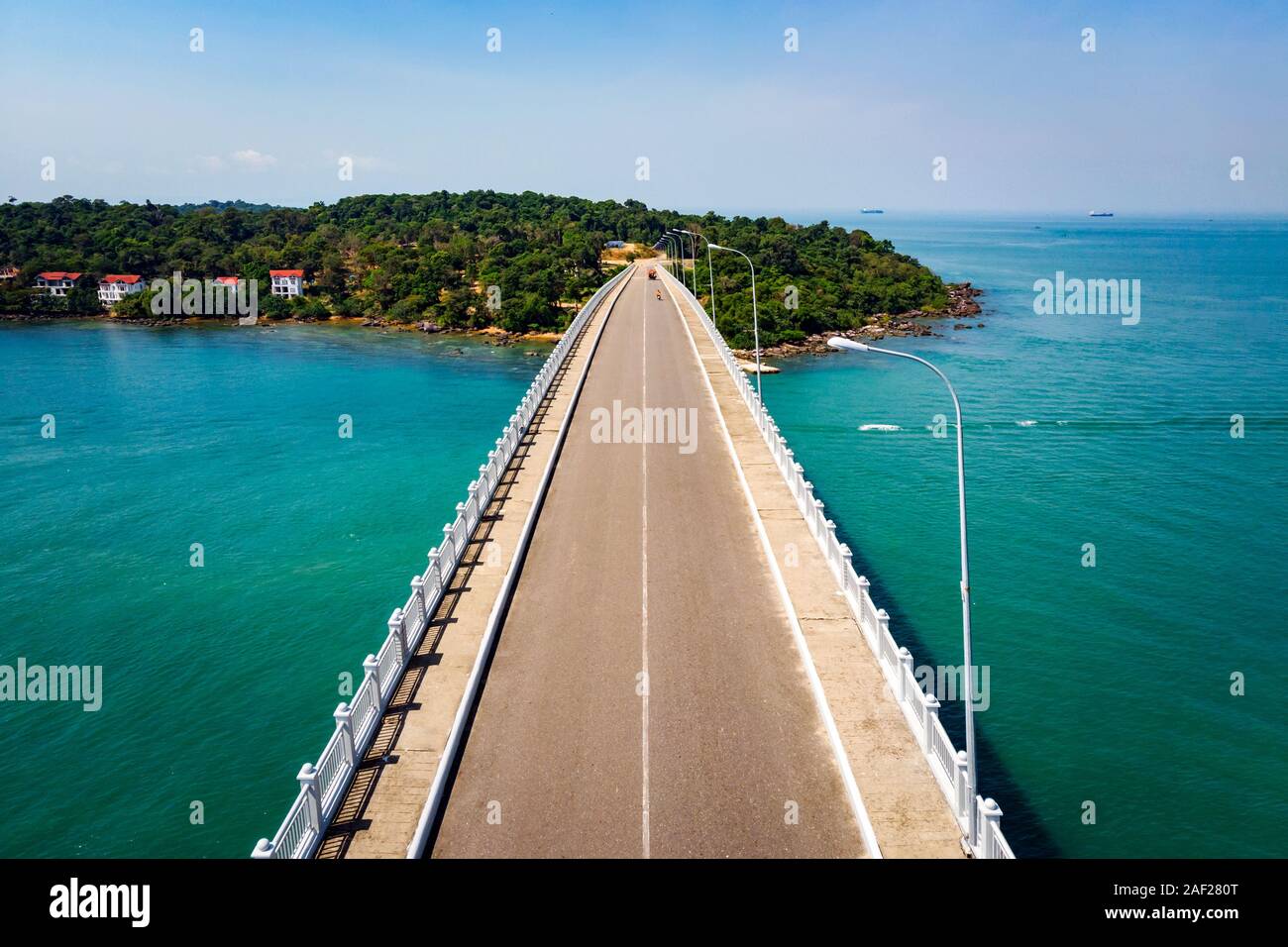Scenic Aerial View of Bridge over the Sea. bridge TECHO MORAKAT to Snake island KOH PUOS. Sihanoukville. Cambodia. Top view aerial view. Stock Photo