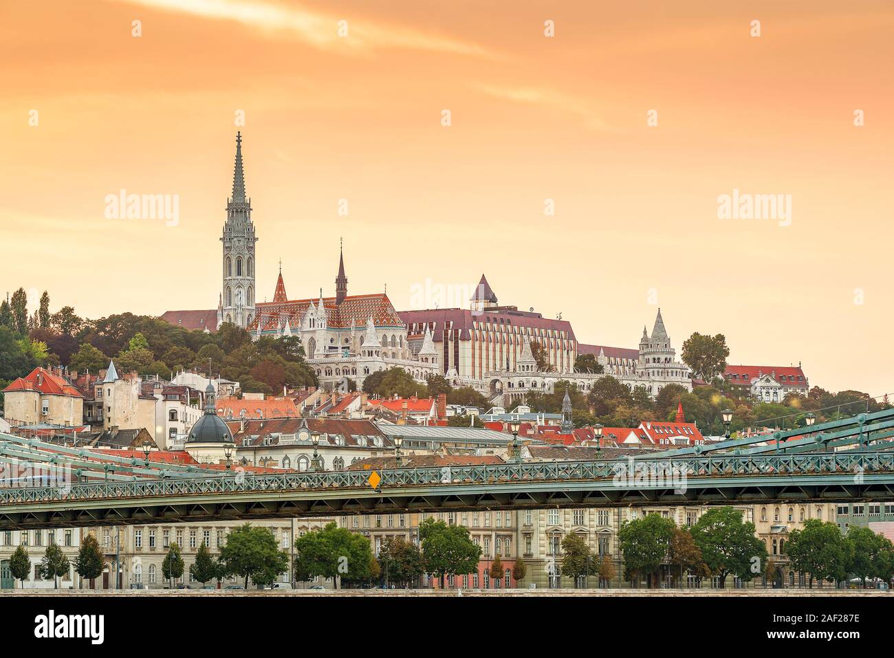 Panoramic vice about the buda side in Budapest, Hungary. Included a part of Szechenyi chain bridge, tower and roof of Matthias church and Fishermasn b Stock Photo