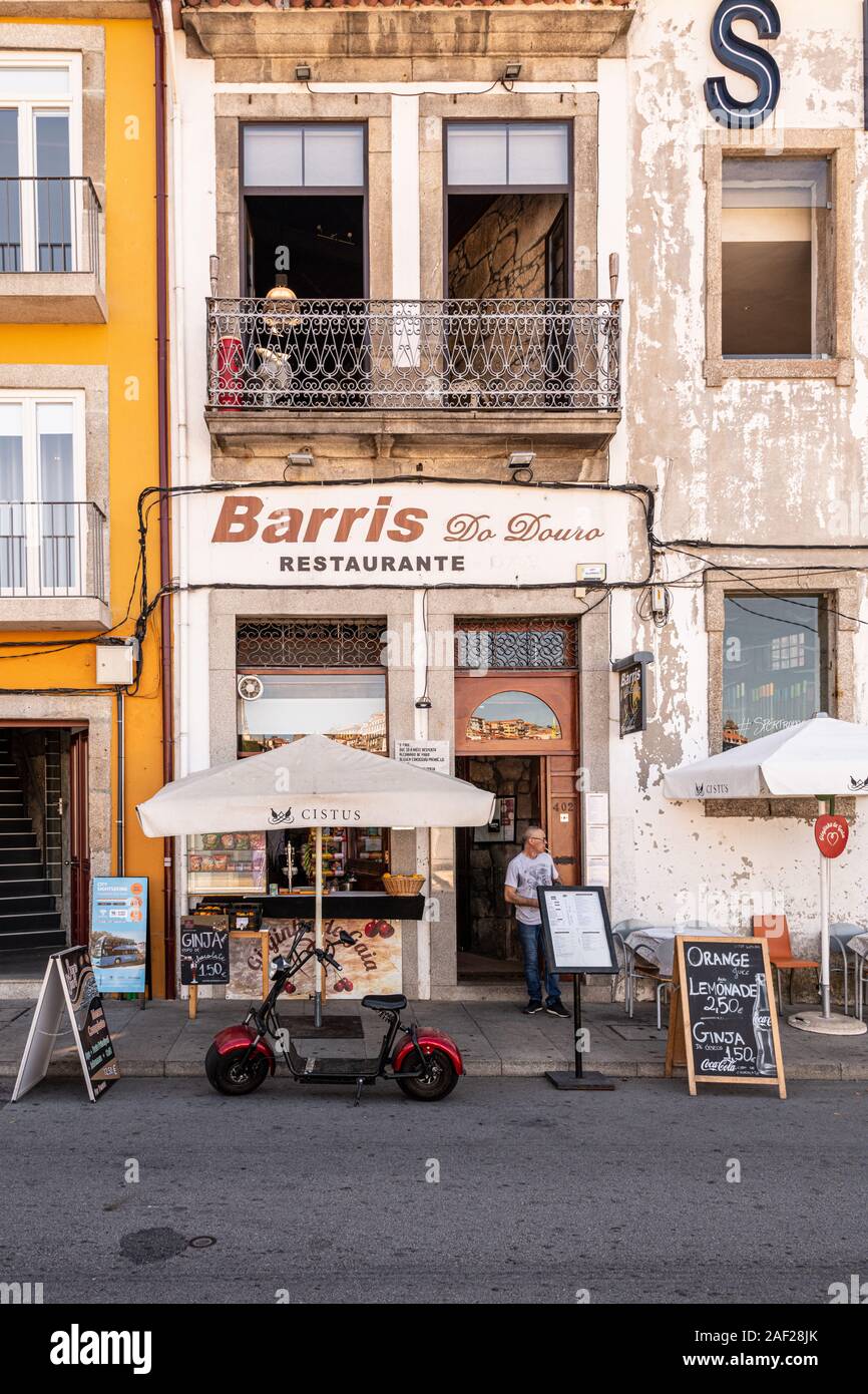 An old street cafe restaurant  on the Vila Nova de Gaia city, Porto, Portugal Stock Photo