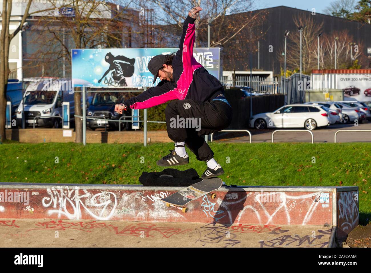 Young man boarding at Radlands Skate Park, Mid Summer Meadow, Northampton, UK. Stock Photo