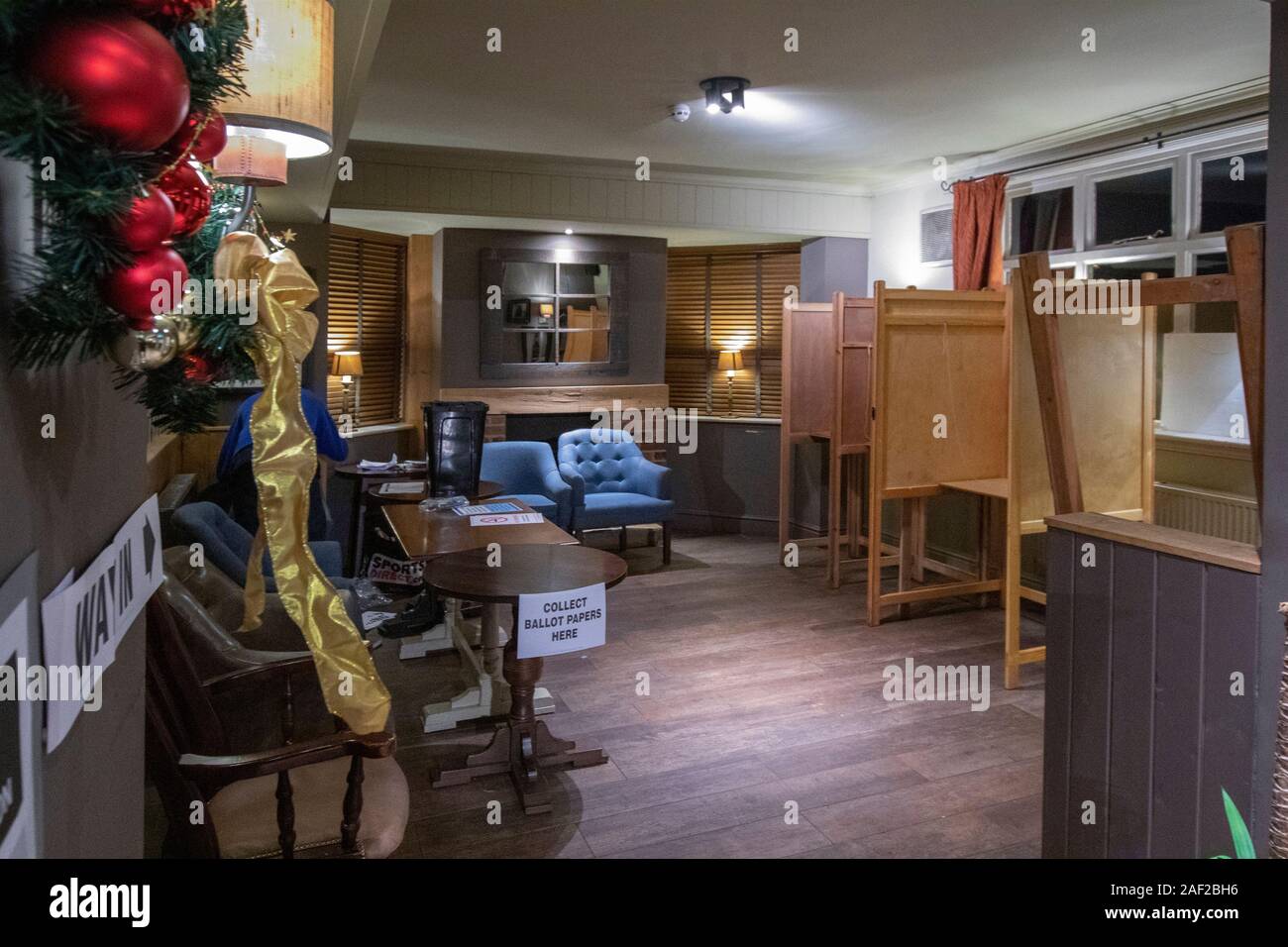 Wombourne, UK. 12th Dec 2019. Early opening for the Wagon and Horses pub on a wet morning in Wombourne as it is in use as a South Staffordshire constituency polling station in the 2019 General Election. This is a new polling station location for local residents compared to previous local and general elections. Credit: Paul Bunch/Alamy Live News. Stock Photo