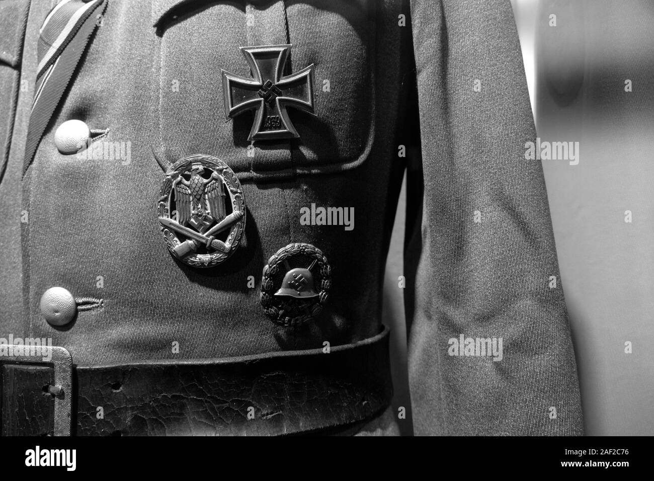 The remains of a Nazi uniform including the Iron Cross medal. Stalag Luft III - Stammlager Luft III near the Polish town of Sagan in Lower Silesia. Th Stock Photo