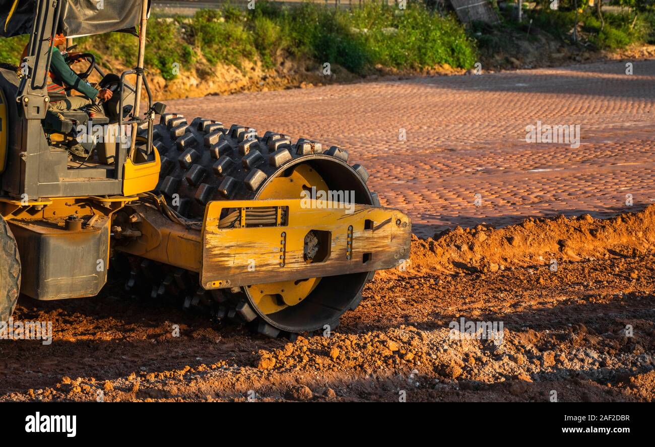 Soil compactor with vibratory padfoot drum. Heavy duty machinery
