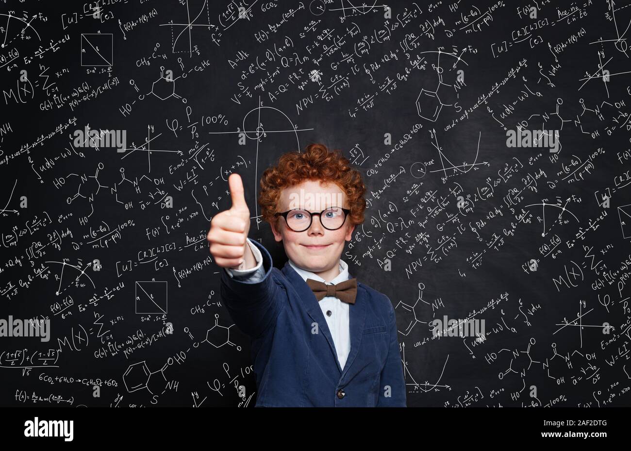 Kid student having fun on science background Stock Photo