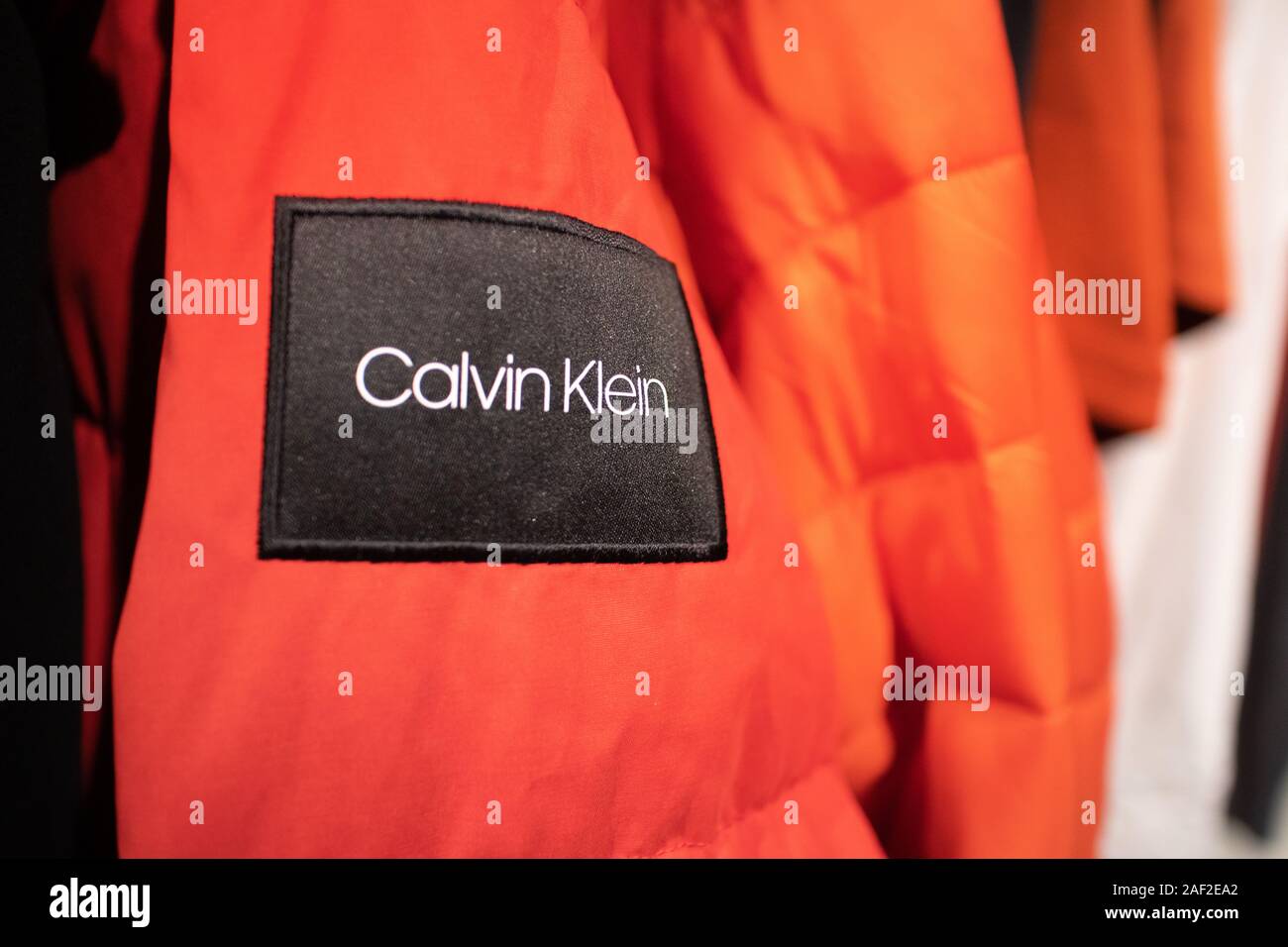 Winter coats by luxury designer label of Calvin Klien hanging on a clothes  rail in a shop Stock Photo - Alamy