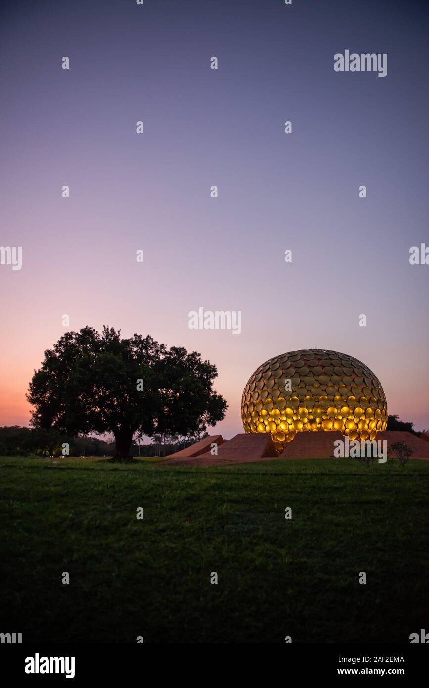 AUROVILLE, INDIA - December 2019: The Matrimandir at sunset Stock Photo