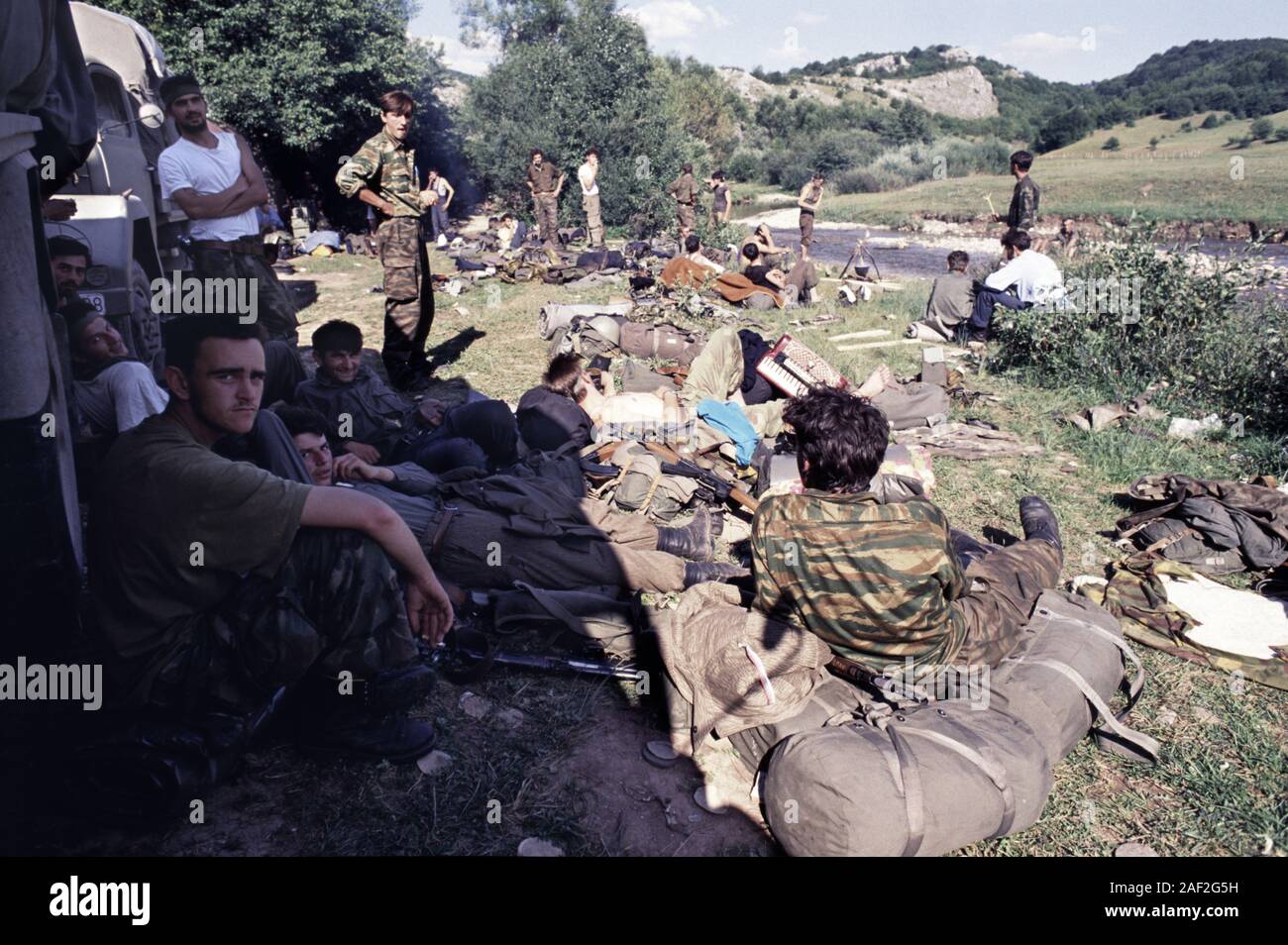 13th August 1993 During the war in Bosnia: BSA (Bosnian-Serb) soldiers relax in the hot sun on Bjelašnica mountain after intense fighting with ARBiH forces. Stock Photo