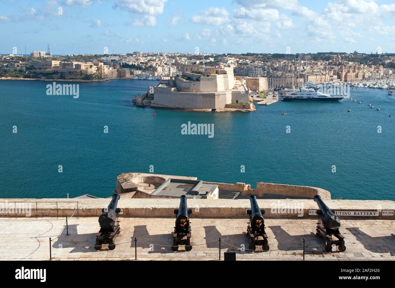 Cannons at the saluting battery, Upper Barracca Gardens, overlooking Valletta,s Grand Harbour Stock Photo