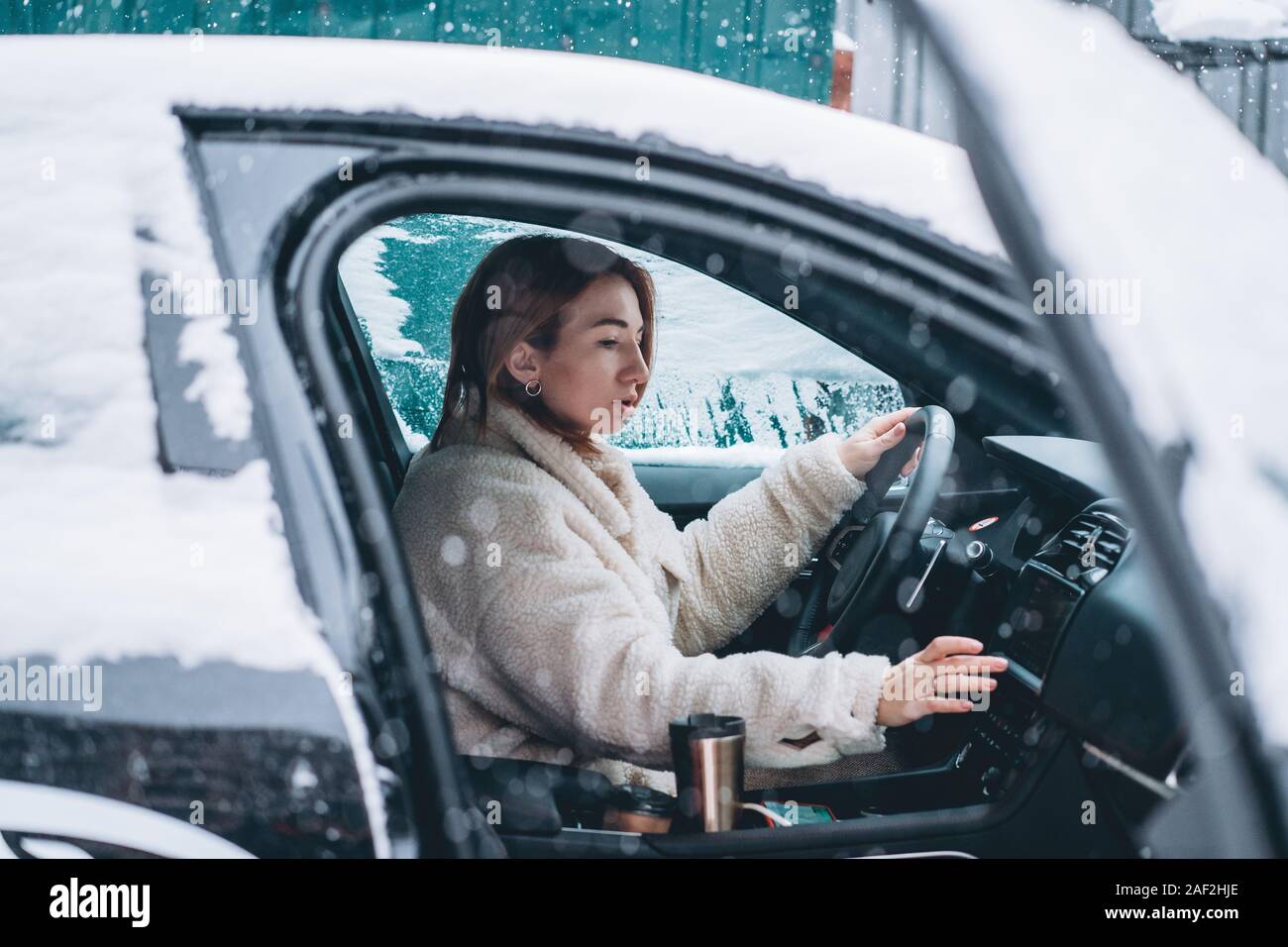 Girl behind steering wheel hi-res stock photography and images - Alamy