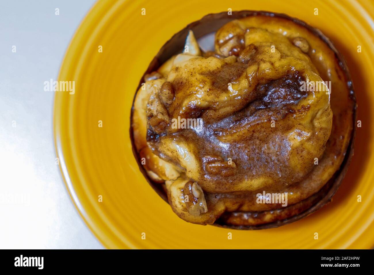 Sticky bun on a plate Stock Photo