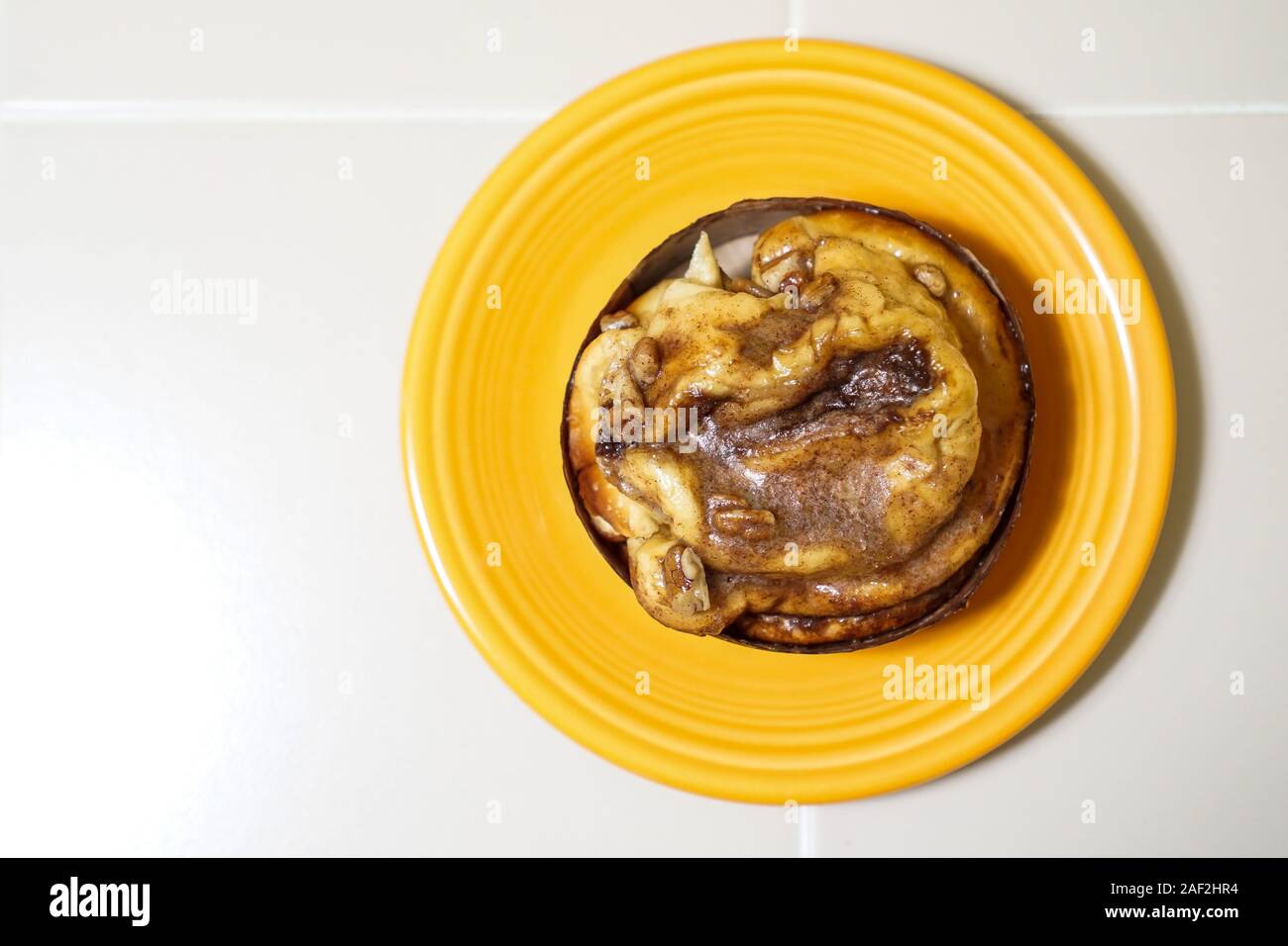 Sticky bun on a plate Stock Photo