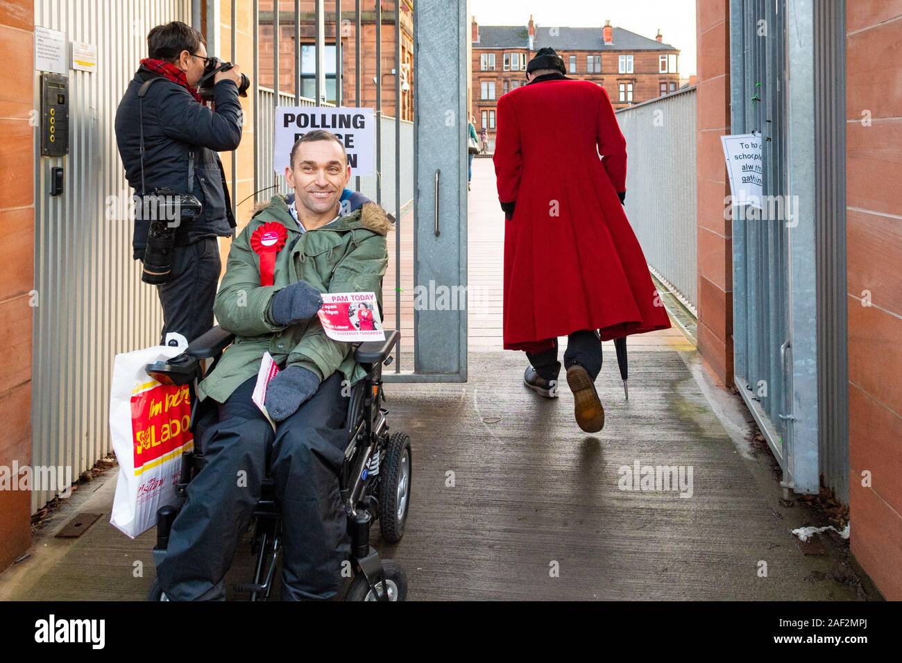 Glasgow, Scotland, UK. 12th Dec, 2019. UK Elections: voters outside the polling place at Notre Dame Primary School in the constituency of Glasgow North Credit: Kay Roxby/Alamy Live News Stock Photo