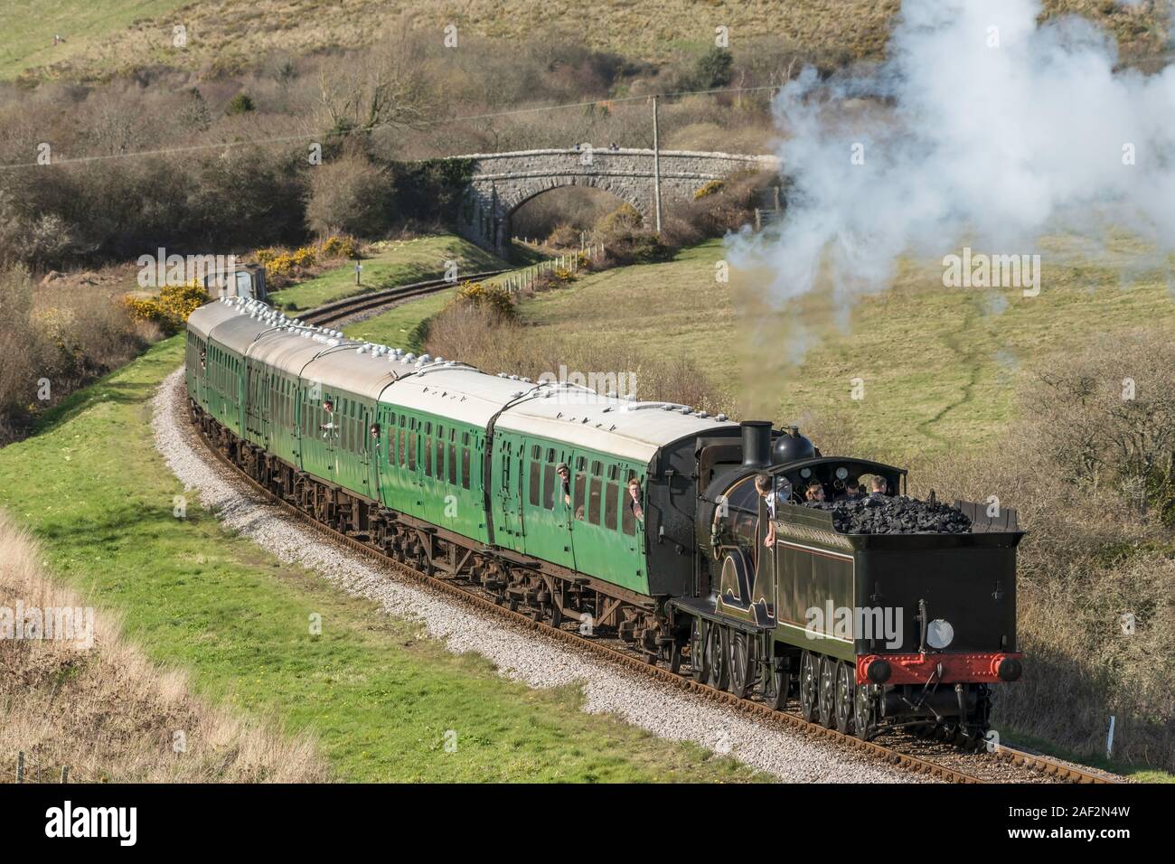 British railway and green coach in Dorset, UK Stock Photo