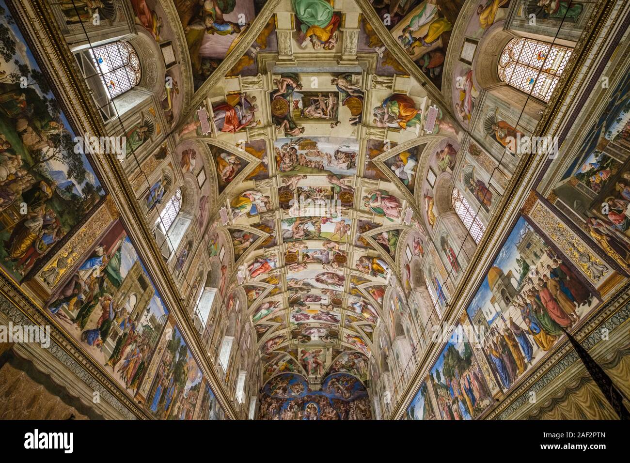 Magnificent interior of the Sistine Chapel, a chapel in the Apostolic Palace inside the Papal Basilica of St. Peter, St. Peter's Basilica Stock Photo