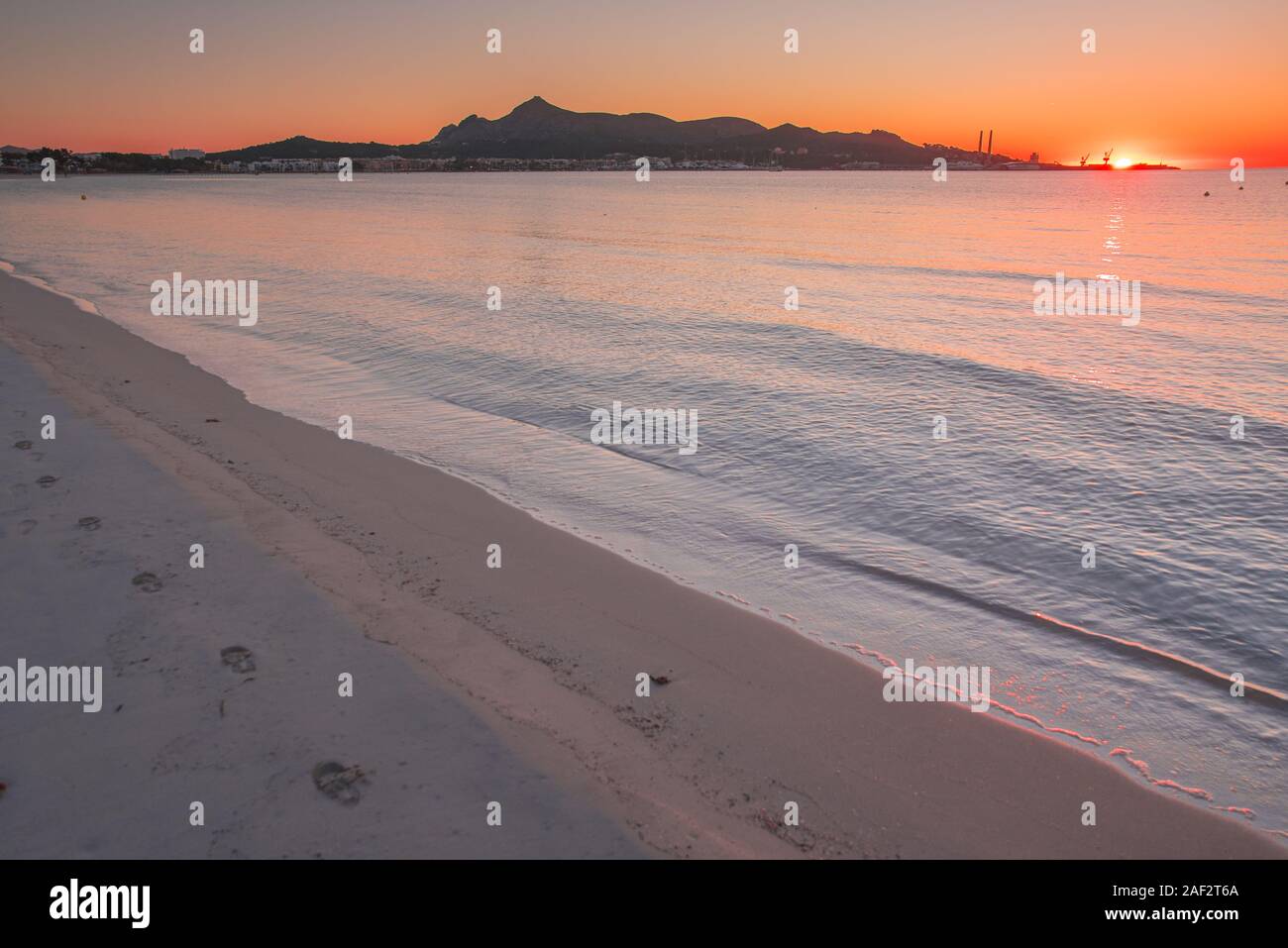 Morning by the beach. Playa de Muro, sunrise sky in background Stock Photo