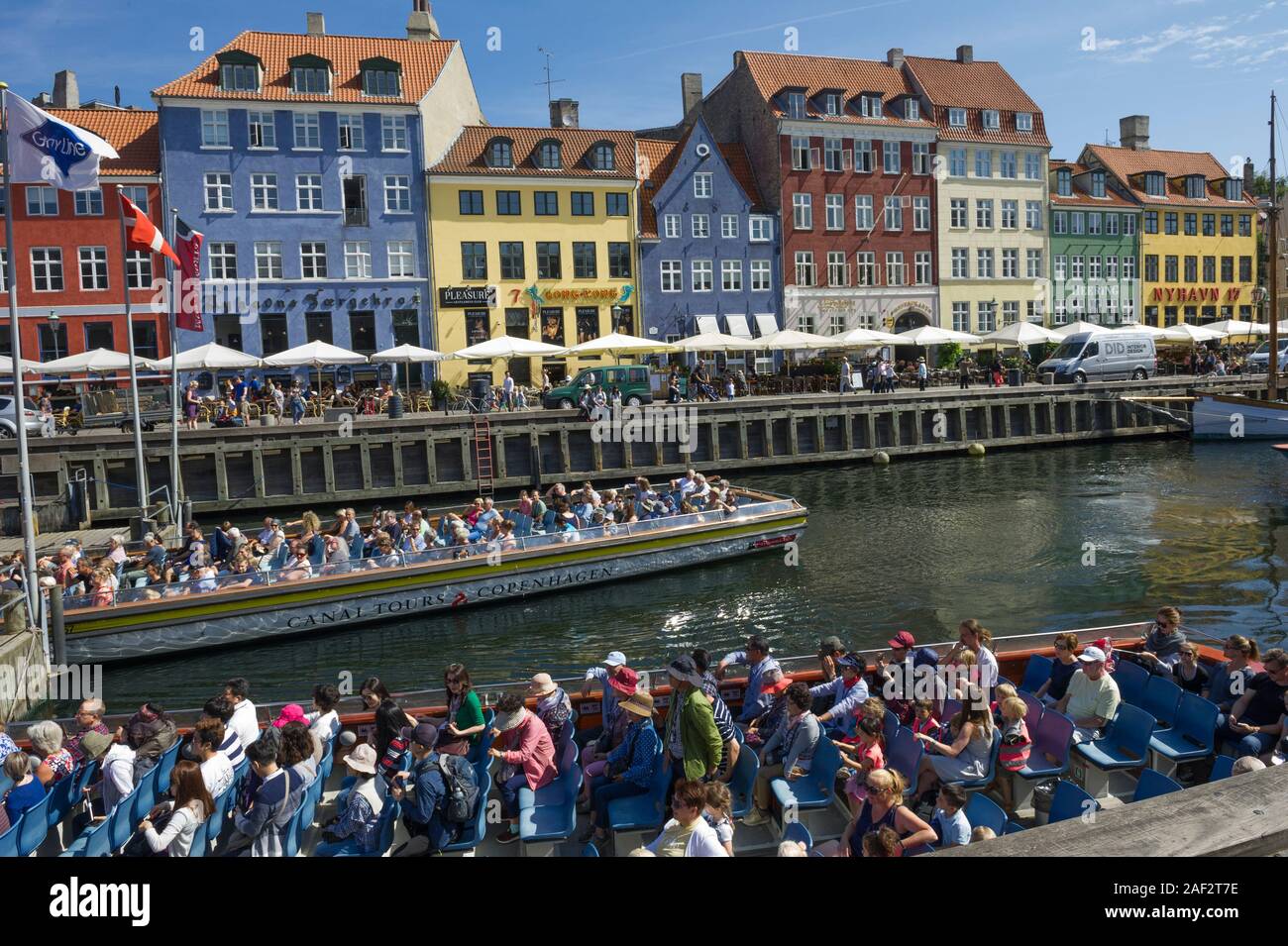 Tourists in boats on the Canal in Copenhagen, Denmark Stock Photo
