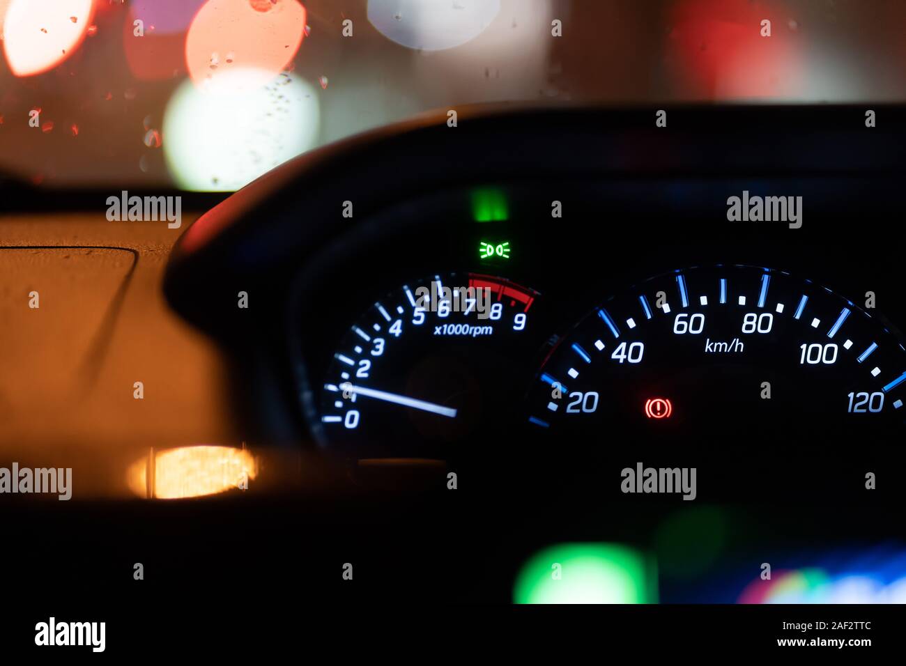 https://c8.alamy.com/comp/2AF2TTC/modern-car-illuminated-dashboard-closeup-2AF2TTC.jpg