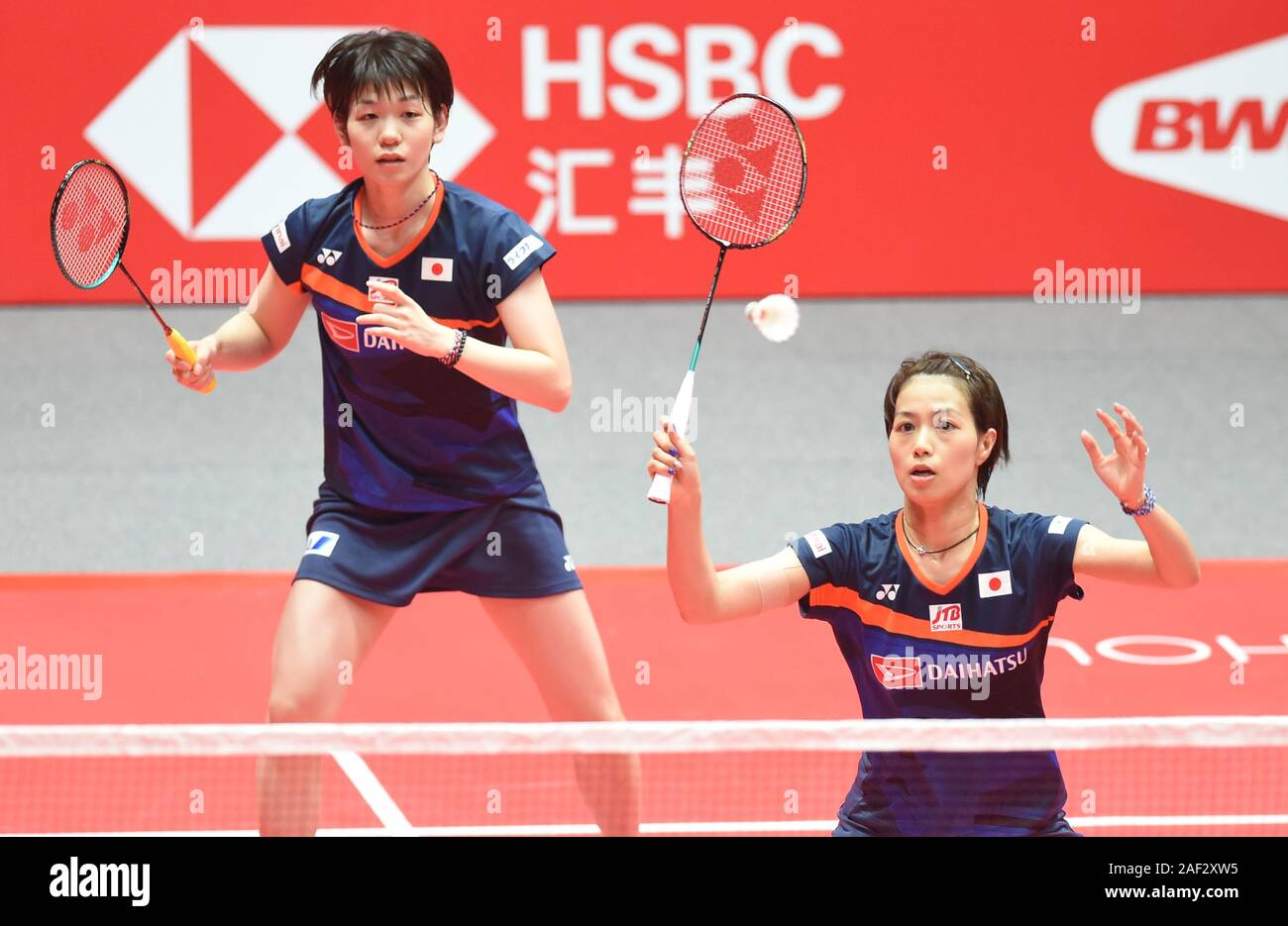 Guangzhou, China's Guangdong Province. 12th Dec, 2019. Yuki Fukushima  (R)/Sayaka Hirota compete during the women's doubles group A match between  Yuki Fukushima/Sayaka Hirota of Japan and Du Yue/Li Yinhui of China at