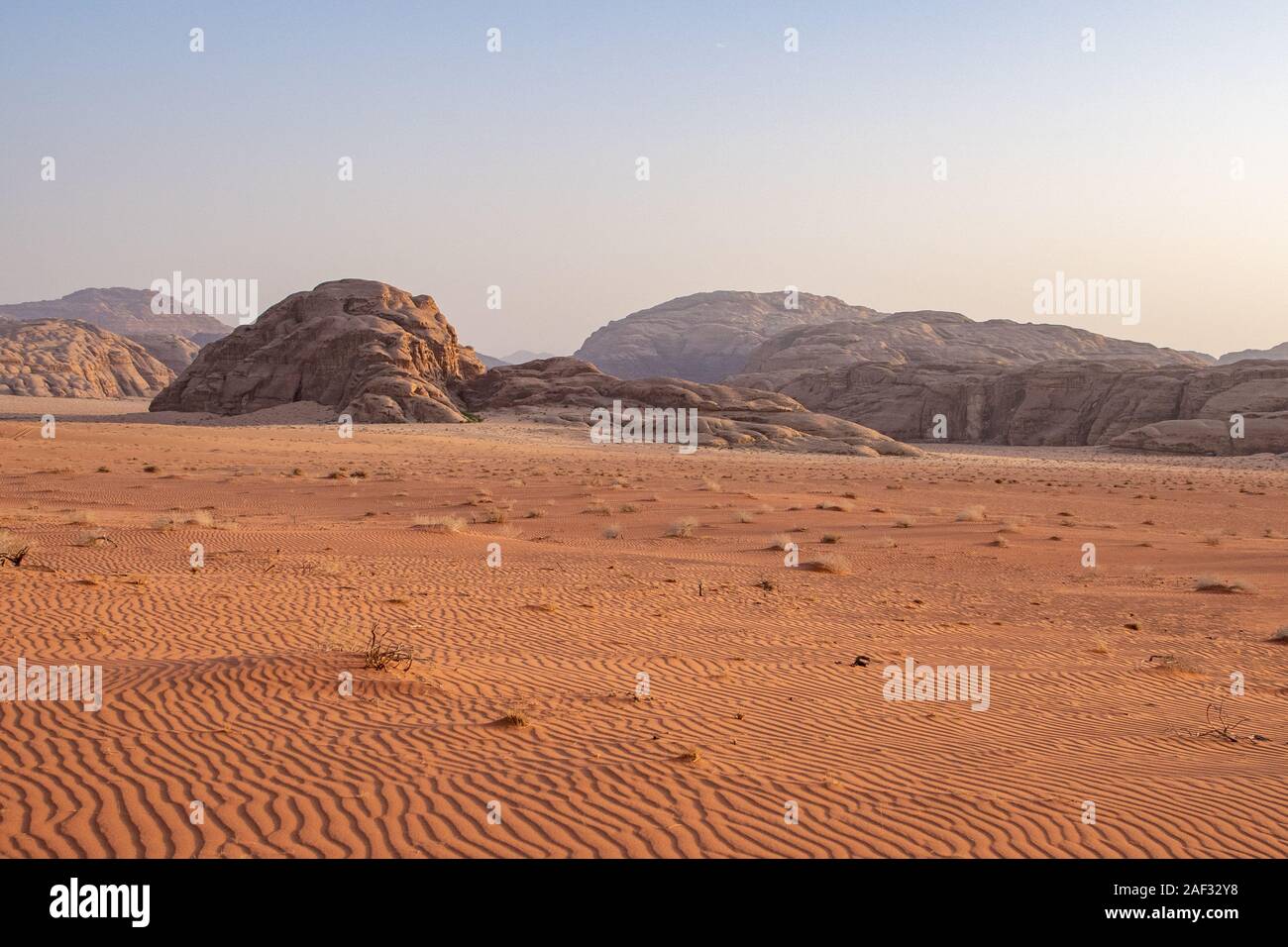 Desert scenery. Red sand plateau at the foot of the Edom mountains, Jordan Stock Photo