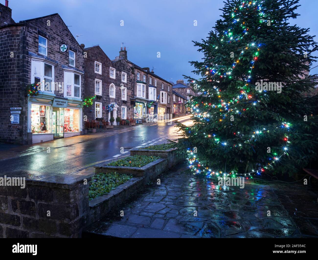 Christmas tree and the High Street at Pateley Bridge at Christmas Nidderdale AONB North Yorkshire England Stock Photo