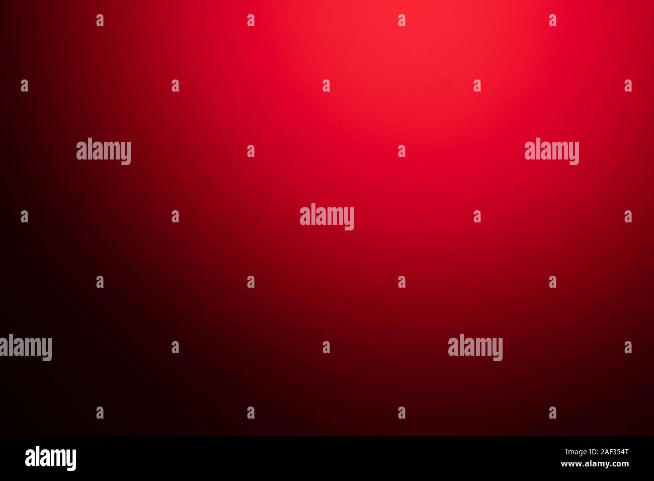 red blurred background with strong black gradient and vignette. Stock Photo