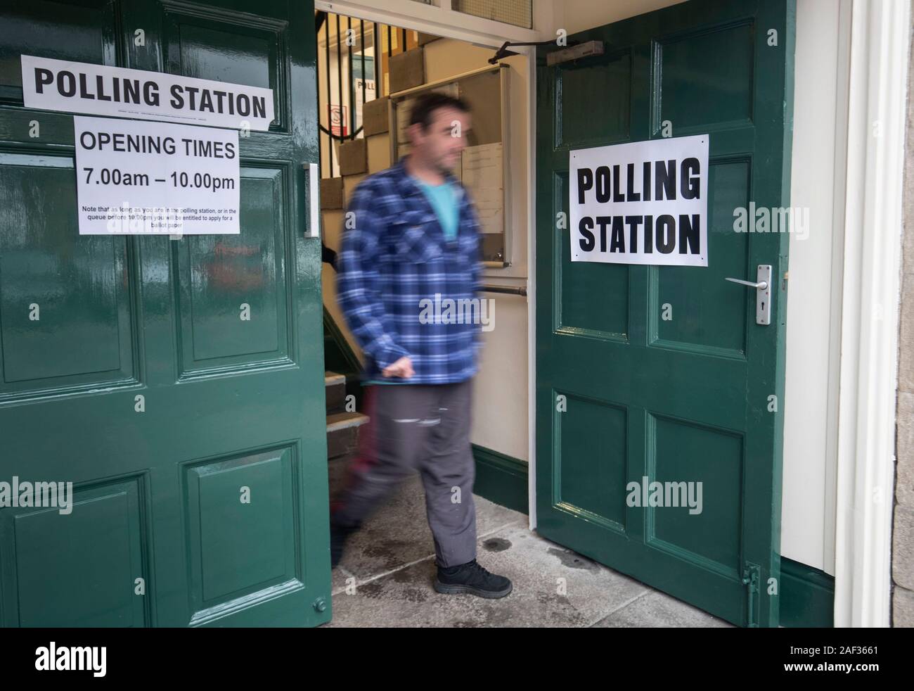 A man leaves a polling station in Hawes, Yorkshire, as voters go to the polls in what has been billed as the most important General Election in a generation. Stock Photo