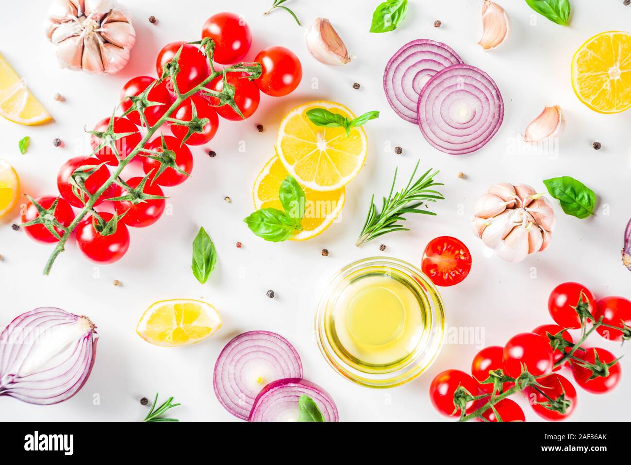 Cooking background with spices, vegetables and herbs fresh basil ...