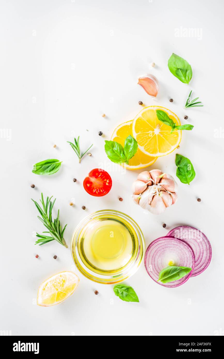 Cooking background with spices, vegetables and herbs fresh basil ...