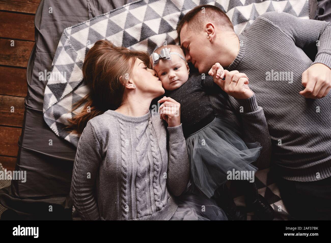 cute baby with mom and dad