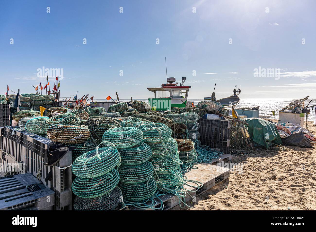 Vila Cha, beach fishing gear and Fisjing fleet Stock Photo - Alamy