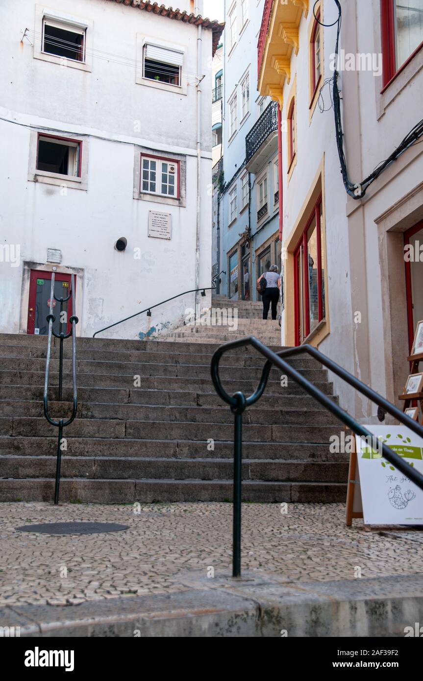 Rua Ferreira Borges passes through the Arco de Almedina. Coimbra, Portugal Stock Photo