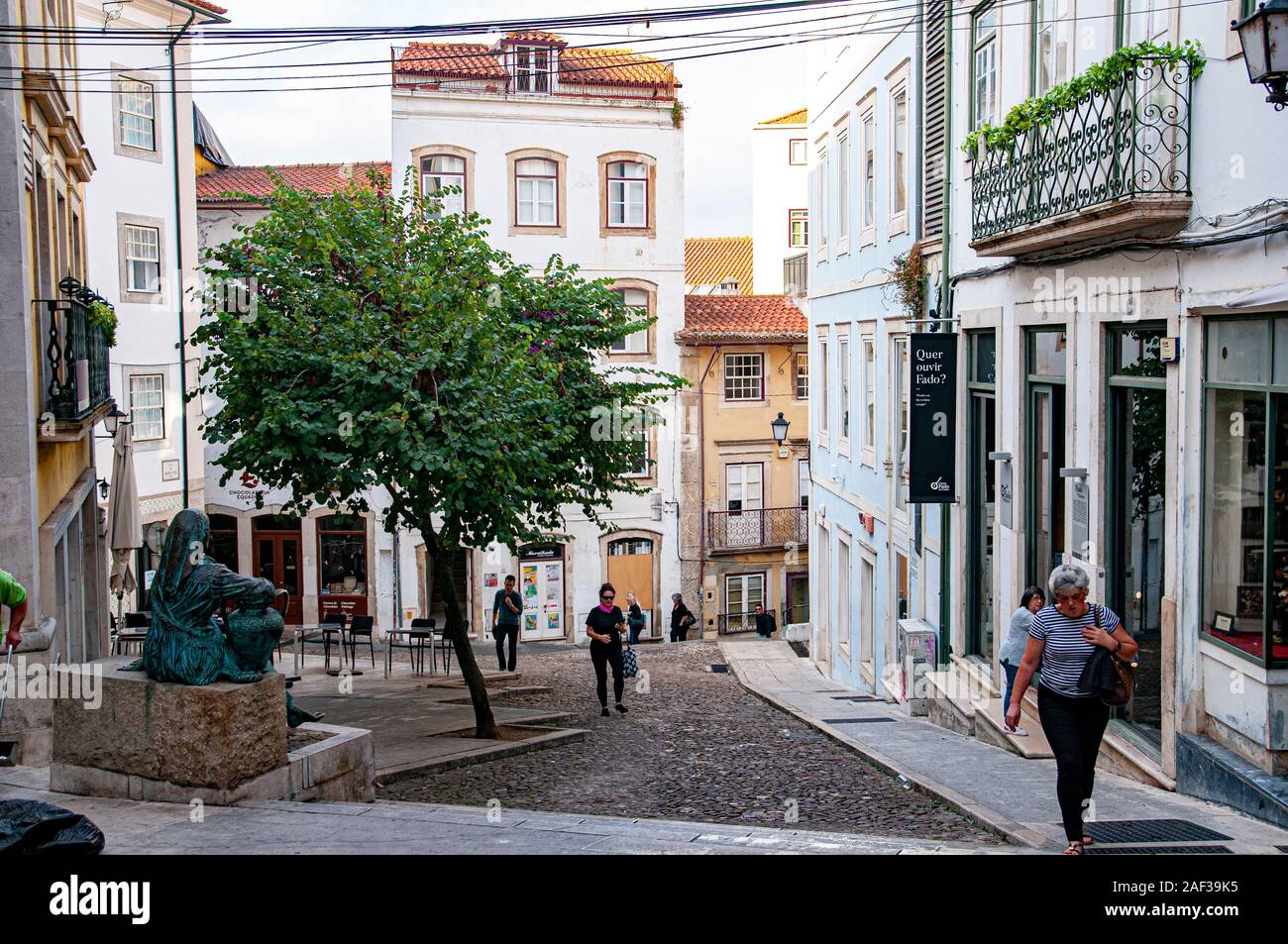 Rua Ferreira Borges passes through the Arco de Almedina. Coimbra, Portugal Stock Photo