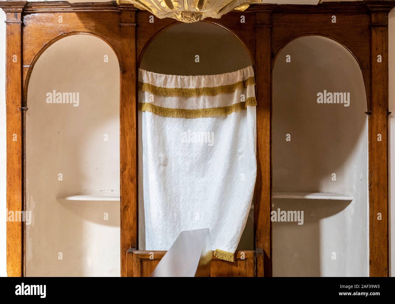 Confession in italian catholic church hi-res stock photography and ...