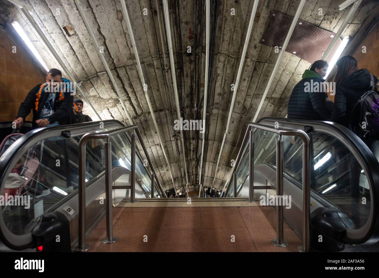 Escalators and stairs leading up and down in Tribunal Subway Station on